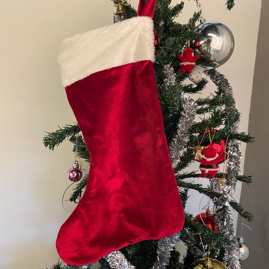 Calza rossa per la decorazione dell'albero di Natale